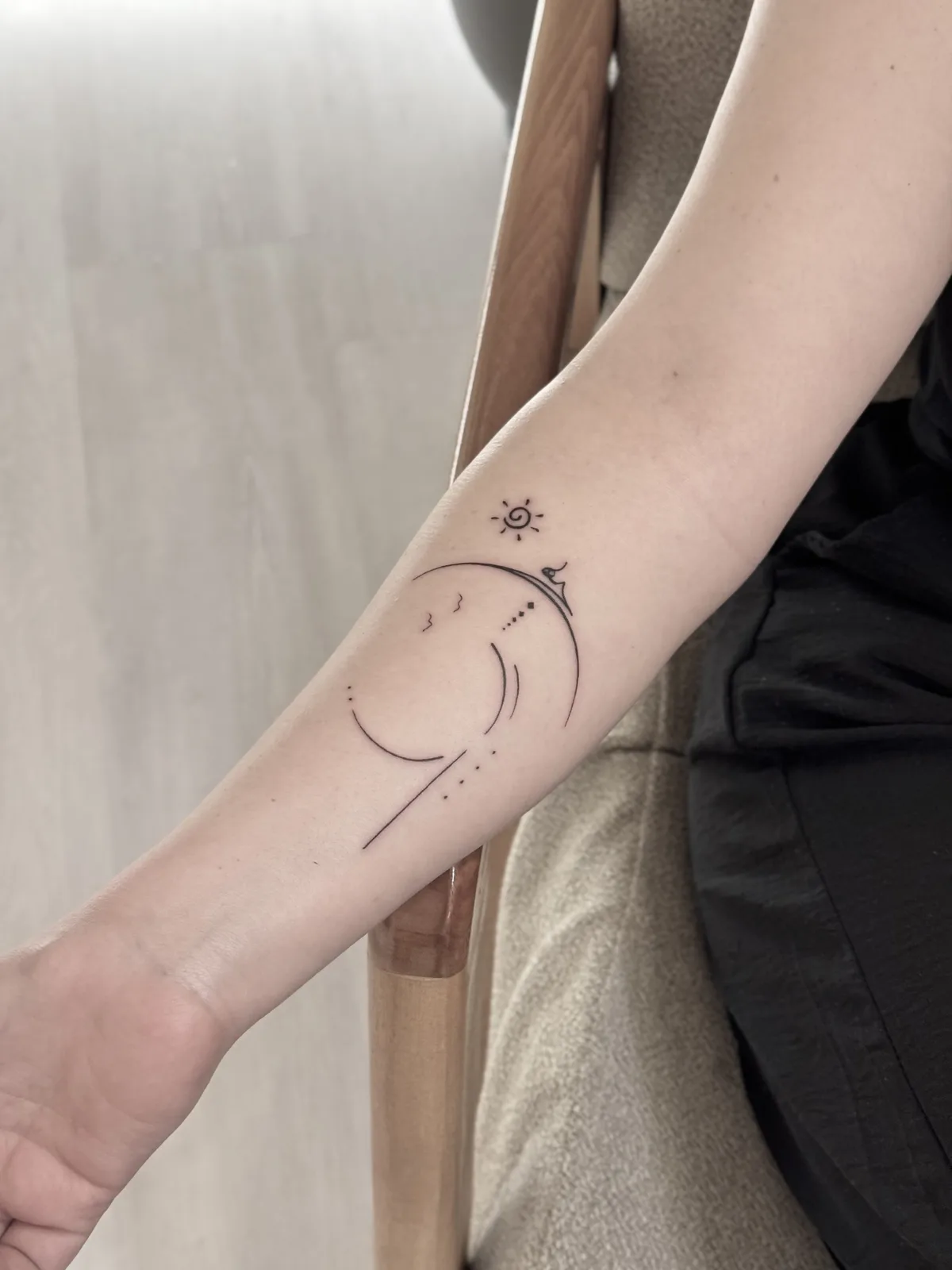 Ornamental — Crescent and sun, forearm